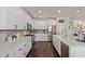 Bright kitchen featuring an island, white cabinets, stainless steel appliances and eat-in kitchen at 1342 E Jade Dr, Chandler, AZ 85286