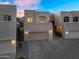 Well-maintained condo with a private garage, balcony, and neatly landscaped front yard at 1414 W Coral Reef Dr, Gilbert, AZ 85233