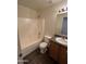 Bathroom features a shower-tub combo and a vanity with good counter space at 15731 W Evans Dr, Surprise, AZ 85379