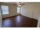 Bedroom with tile flooring, natural lighting, and spacious layout at 15731 W Evans Dr, Surprise, AZ 85379