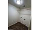 Walk-in closet with a wooden rod for hanging clothes and easy access at 15731 W Evans Dr, Surprise, AZ 85379