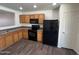 Functional kitchen featuring essential appliances and ample cabinet space for all your cooking needs at 15731 W Evans Dr, Surprise, AZ 85379