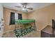 bedroom featuring a bunk bed, and a decorative rug at 15737 W Lundberg St, Surprise, AZ 85374