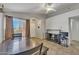 Inviting dining space showcasing a wooden table, tile floors, and natural light from the window at 15737 W Lundberg St, Surprise, AZ 85374
