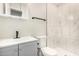 Updated bathroom featuring a vanity, sleek fixtures, and a tiled shower at 17228 N 16Th Dr # 3, Phoenix, AZ 85023