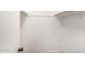 An empty closet with an open door and clothing bar at 17228 N 16Th Dr # 3, Phoenix, AZ 85023