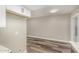 Bright dining area featuring wood-style flooring and modern white baseboards at 17228 N 16Th Dr # 3, Phoenix, AZ 85023