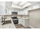 Contemporary kitchen featuring stainless steel appliances, white cabinetry, and marble counters at 17228 N 16Th Dr # 3, Phoenix, AZ 85023