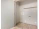 An inside laundry room has a utility sink and ample space for storage at 17228 N 16Th Dr # 3, Phoenix, AZ 85023