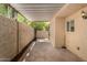 An open patio extends to an enclosed yard with space for outdoor entertaining at 17228 N 16Th Dr # 3, Phoenix, AZ 85023