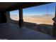 Spacious backyard ready for personalization and outdoor entertaining, with views of the surrounding landscape at 17535 W Fulton St, Goodyear, AZ 85338