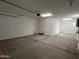 Spacious garage providing ample parking and storage, and easy access to the home at 17535 W Fulton St, Goodyear, AZ 85338