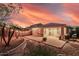 Cozy backyard featuring a paved patio with outdoor seating and lighting at 1783 W Cool Water Way, San Tan Valley, AZ 85144