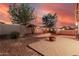 Large backyard featuring gravel, a paved patio and a built-in firepit at 1783 W Cool Water Way, San Tan Valley, AZ 85144