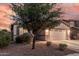 Charming home with two-car garage and low-maintenance landscaping for easy living at 1783 W Cool Water Way, San Tan Valley, AZ 85144