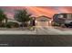 Charming single-story home with a two-car garage and well-manicured landscaping at 1783 W Cool Water Way, San Tan Valley, AZ 85144