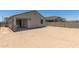 A level lot with desert landscaping and block wall offers opportunities for personalization at 18340 W Patrick Ln, Surprise, AZ 85387