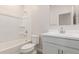 A clean and well-lit bathroom with a shower-tub combination and a modern vanity at 18340 W Patrick Ln, Surprise, AZ 85387