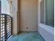Private courtyard with an ornamental gate and covered patio area at 19969 N Santa Cruz Dr, Maricopa, AZ 85138