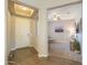 View of the front entry and a view of the living room at 19969 N Santa Cruz Dr, Maricopa, AZ 85138