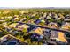Idyllic aerial view of a community with lush greenery, swimming pools, and beautiful homes at 2058 E Marlene Dr, Gilbert, AZ 85296