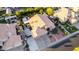 Beautiful single Gathering home featuring a Spanish tile roof, three car garage, and landscaped front yard at 2058 E Marlene Dr, Gilbert, AZ 85296