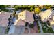 Lovely single Gathering home with an arched entryway, desert landscaping, and a three car garage at 2058 E Marlene Dr, Gilbert, AZ 85296