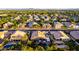 A picturesque aerial shot of a neighborhood shows charming homes and well-manicured landscapes at 2058 E Marlene Dr, Gilbert, AZ 85296