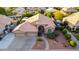 Overhead shot of a single Gathering home with a three car garage and professionally landscaped yard at 2058 E Marlene Dr, Gilbert, AZ 85296