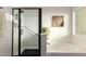 Bathroom with glass shower and tub; bright space and granite accents at 2058 E Marlene Dr, Gilbert, AZ 85296