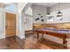 Spacious game room featuring a billiards table, wood flooring, and high ceilings at 2058 E Marlene Dr, Gilbert, AZ 85296