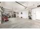 Bright, clean garage with storage and space for vehicles or hobbies and extra storage at 2058 E Marlene Dr, Gilbert, AZ 85296
