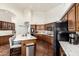 Modern kitchen boasts a large island, stainless steel appliances, granite countertops, and designer cabinetry at 2058 E Marlene Dr, Gilbert, AZ 85296