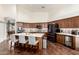 Spacious kitchen featuring a large island, custom cabinetry, stainless steel appliances, and modern finishes at 2058 E Marlene Dr, Gilbert, AZ 85296
