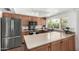 Updated kitchen boasts stainless steel appliances and ample counter space at 2312 W Temple St, Chandler, AZ 85224