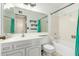 Full bathroom with vanity sink, mirror and tub-shower combo at 2437 E North Ln, Phoenix, AZ 85028