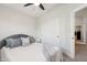 Bright bedroom features a soft gray headboard, white walls, and a large closet for ample storage at 2604 N 27Th St # 17, Phoenix, AZ 85008