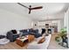 Open concept living room with modern furnishings and wood-style tile flooring throughout at 2604 N 27Th St # 17, Phoenix, AZ 85008