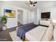 Tranquil main bedroom features a modern decor, ensuite bathroom and plenty of natural light at 297 W Tamarack Dr, San Tan Valley, AZ 85140