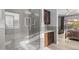 This bathroom features a walk-in shower and dark wood cabinets at 3049 E Longhorn Dr, Gilbert, AZ 85297