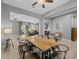Open dining area showcasing seamless transition to the living room, hardwood floors and a stylish decor at 3049 E Longhorn Dr, Gilbert, AZ 85297