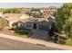 Attractive single-Gathering home with stone detailing, solar panels, a neat lawn, and a two-car garage, ideal for modern living at 3049 E Longhorn Dr, Gilbert, AZ 85297