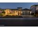 Charming single-Gathering home featuring stone accents, tiled roof, well-manicured lawn, and a two-car garage, perfect for comfortable living at 3049 E Longhorn Dr, Gilbert, AZ 85297