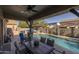 Lovely covered patio and refreshing pool, perfect for outdoor entertaining or relaxing in style at 3049 E Longhorn Dr, Gilbert, AZ 85297