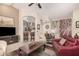 Open concept living room with a seamless view of the kitchen, creating an inviting space for entertaining and relaxation at 3440 E Southern Ave # 1088, Mesa, AZ 85204
