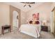 Comfortable bedroom with an arched doorway that leads to the ensuite at 3440 E Southern Ave # 1088, Mesa, AZ 85204