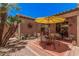 This patio offers a seating area, shade, and desert landscaping at 3440 E Southern Ave # 1088, Mesa, AZ 85204