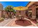 This patio offers a seating area, shade, and desert landscaping at 3440 E Southern Ave # 1088, Mesa, AZ 85204