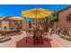 This patio offers a seating area, shade, and desert landscaping at 3440 E Southern Ave # 1088, Mesa, AZ 85204