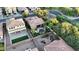 Aerial view of a home with a backyard pool, patio area, and green landscaping in a quiet residential neighborhood at 3622 E Sparrow Pl, Chandler, AZ 85286